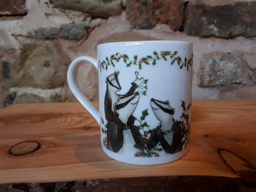 Christmas Badgers China Mug, Badgers with holly, ivy and mistletoe illustrations by Alice Draws The Line